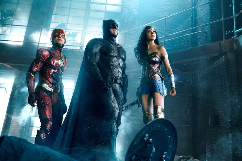 From left: Ezra Miller as The Flash, Ben Affleck as Batman and Gal Gadot as Wonder Woman in "Justice League."