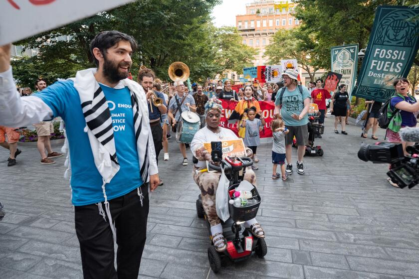 Rabbi Jacob Siegel takes part in an interfaith protest outside Citigroup headquarters in New York in July.