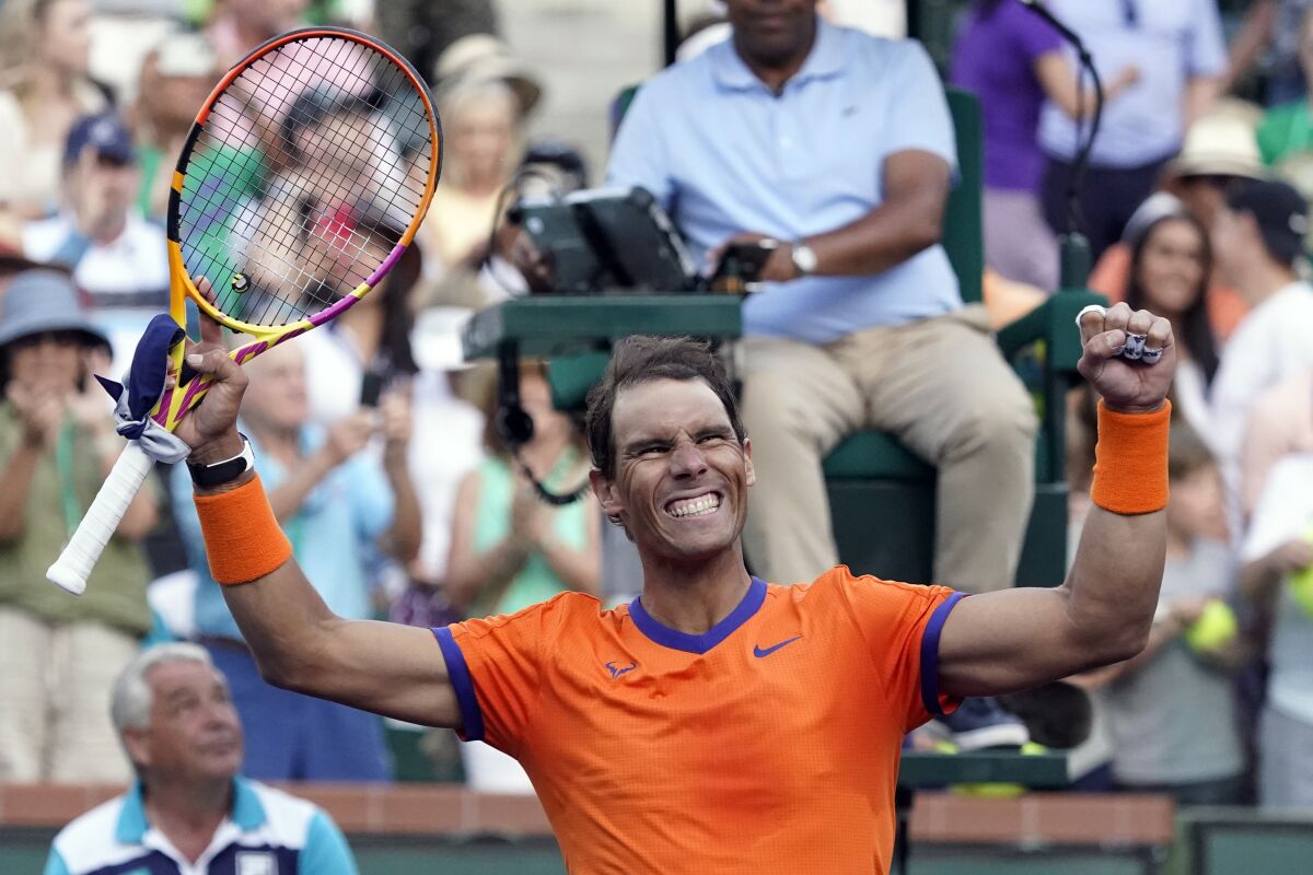 Rafael Nadal celebrates after defeating Nick Kyrgios.