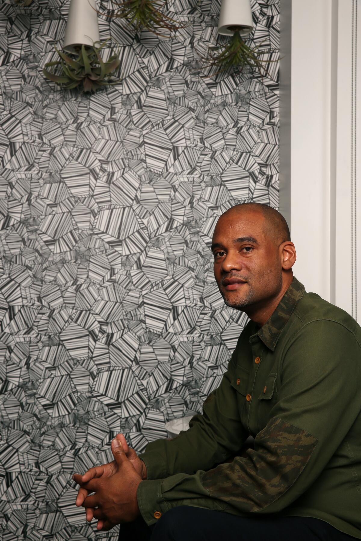 Karim Webb poses for a portrait at his offices on November 22, 2019