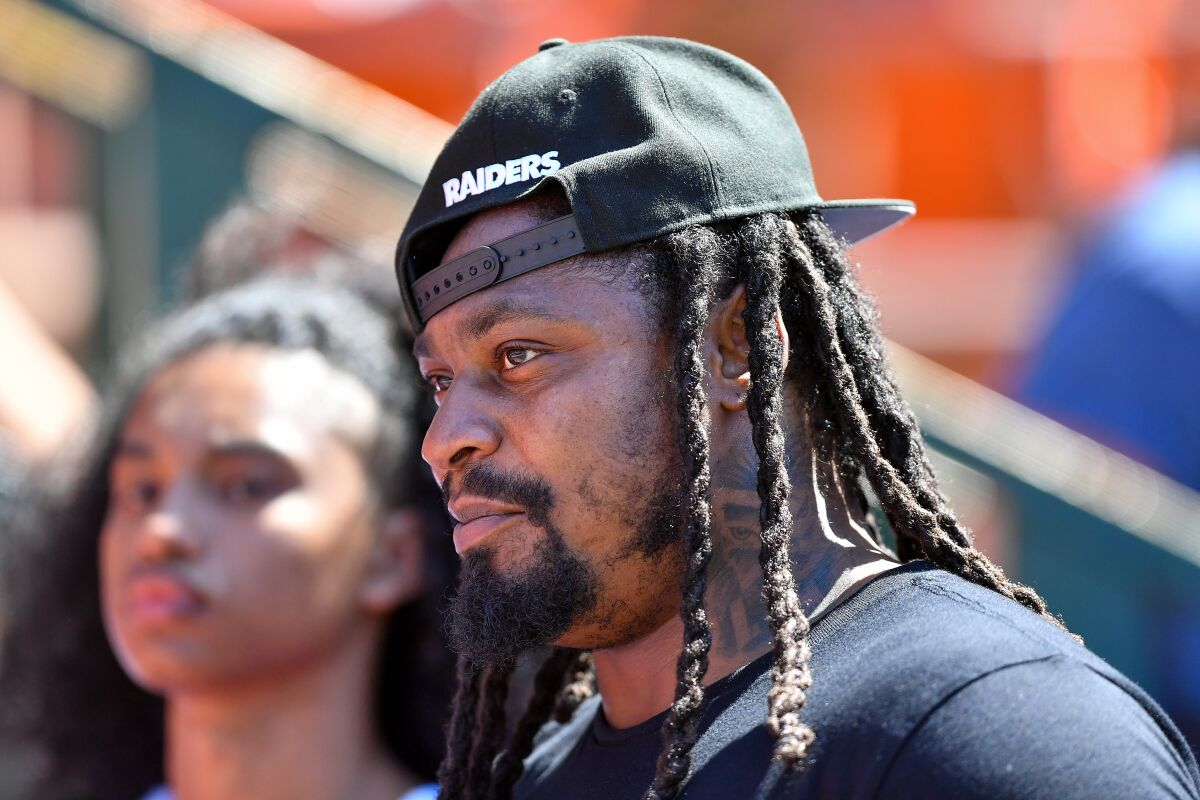 Marshawn Lynch attends a preseason game between the Rams and Dallas Cowboys on Aug. 17 in Honolulu.