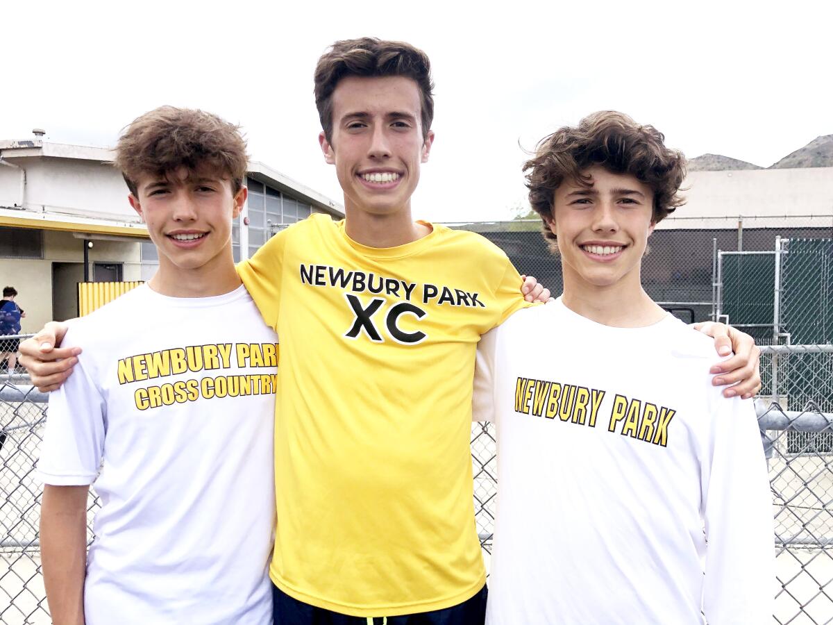 Newbury Park distance standout Nico Young (center) with twin brothers Lex (left) and Leo.