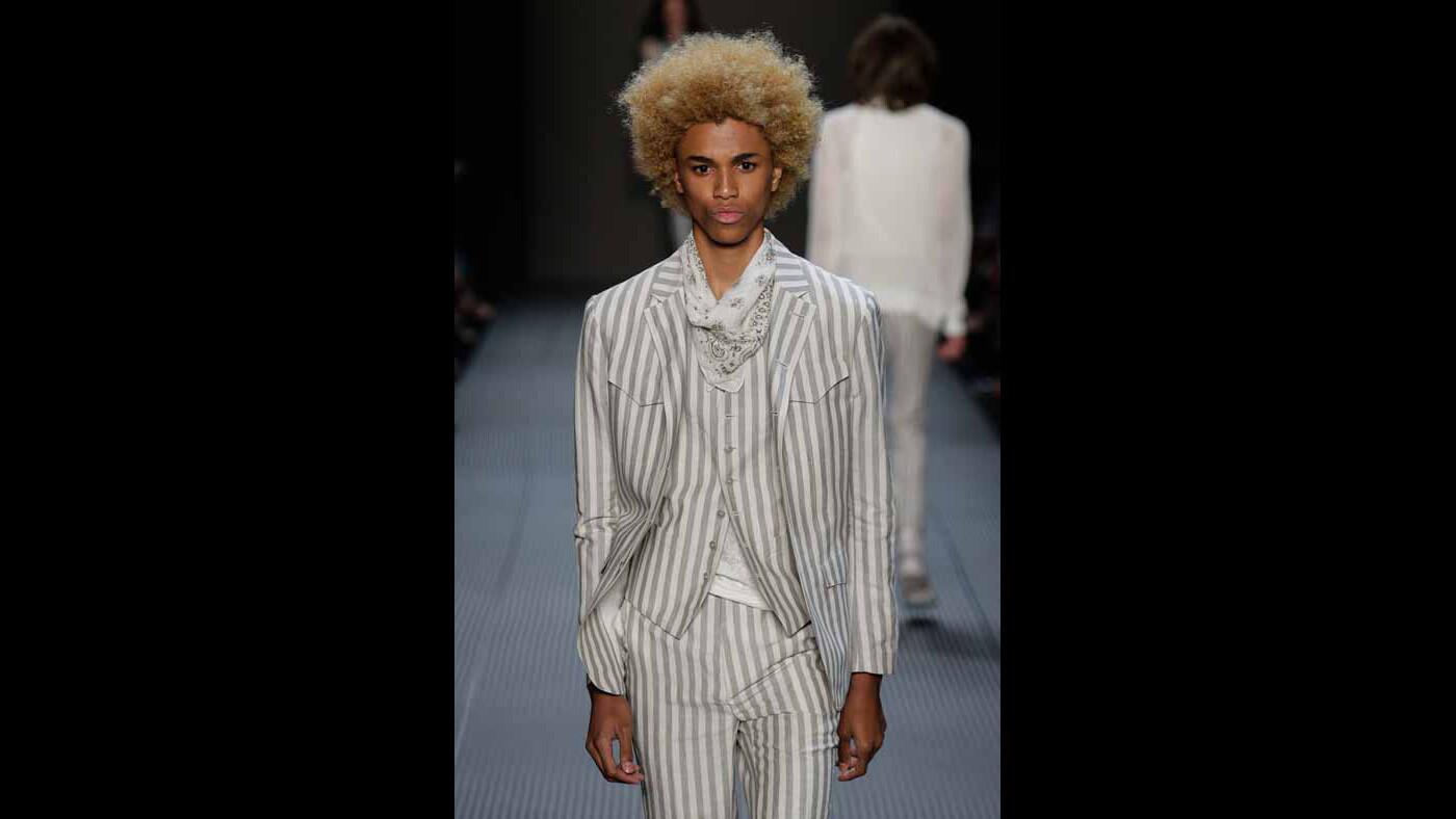 A model walks the runway at the John Varvatos spring 2016 menswear show.