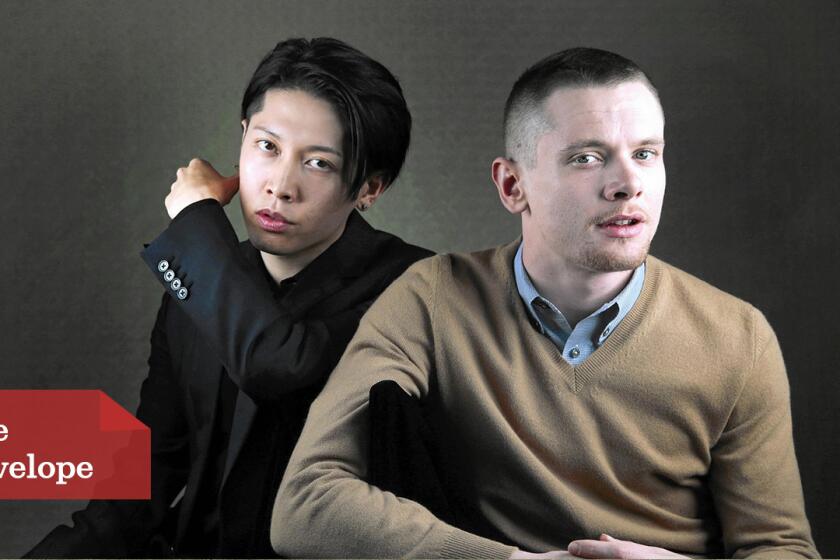 Actors Miyavi, left, and Jack O'Connell portray enemies in a World War II prison camp.