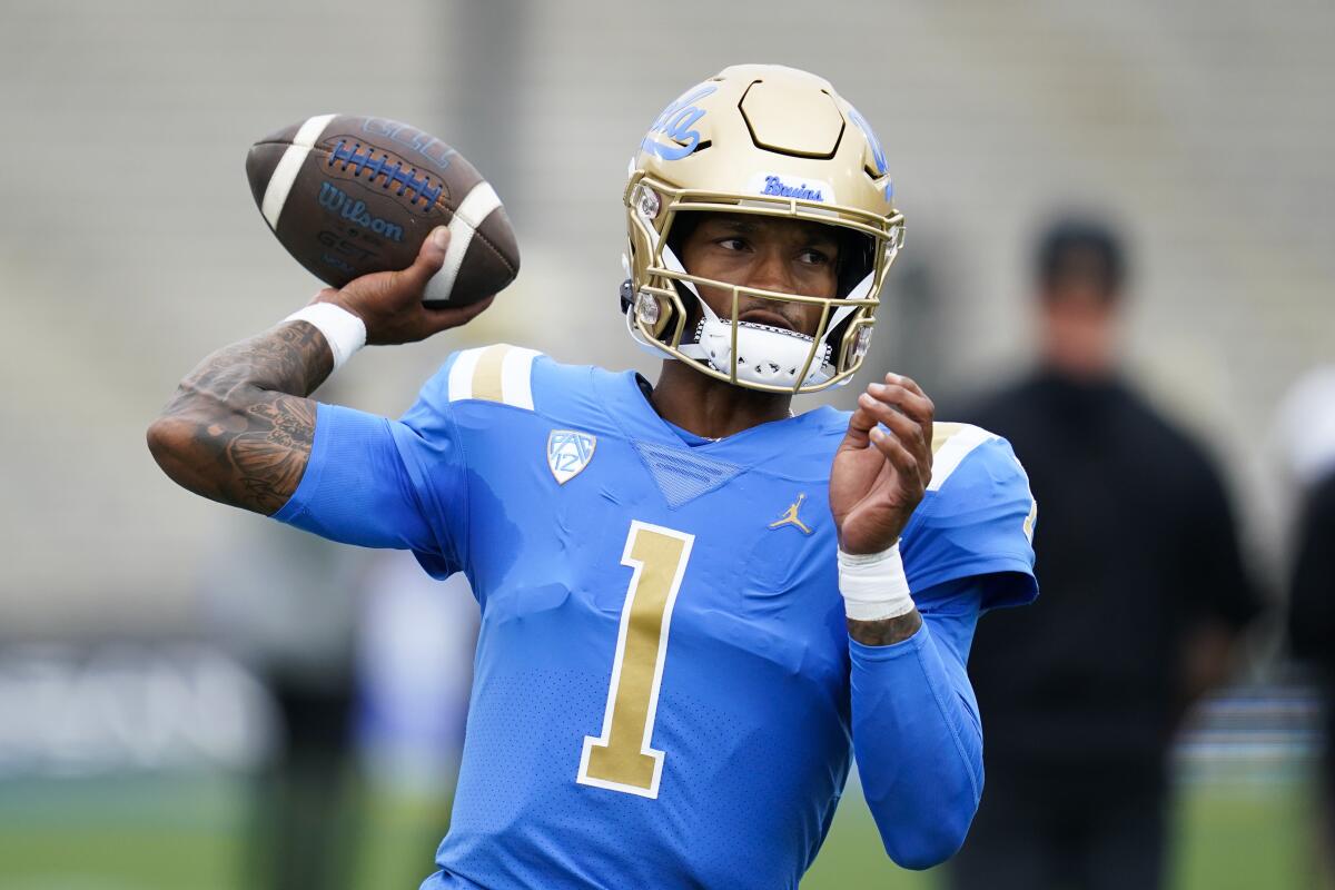 UCLA quarterback Dorian Thompson-Robinson warms up.