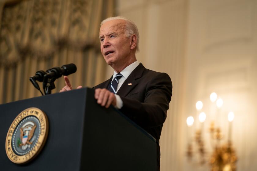 WASHINGTON, DC - SEPTEMBER 09: President Joe Biden delivers remarks on his plan to stop the spread of the Delta variant and boost COVID-19 vaccinations, in the State Dining Room of the White House complex on Thursday, Sept. 9, 2021 in Washington, DC. The President announced expanded efforts to stamp out the lingering pandemic, including stricter rules to get more Americans vaccinated against COVID-19 and additional funding for testing. (Kent Nishimura / Los Angeles Times)