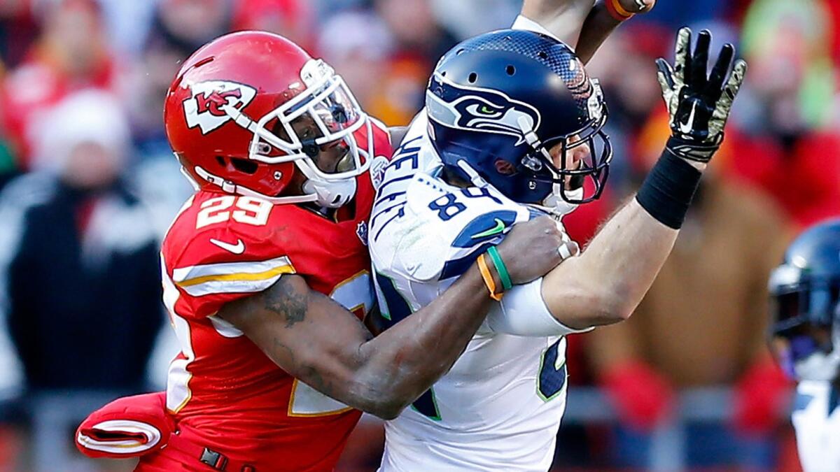 Kansas City Chiefs safety Eric Berry, left, prevents Seattle Seahawks tight end Cooper Helfet from catching a pass during the Chiefs' win on Nov. 16.