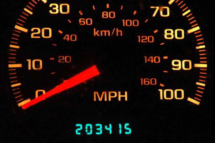 This photo shows an odometer reading 203,415 miles. In the 1970s, most experts considered 100,000 miles to be the benchmark of longevity. "We consistently, on any given day, usually have multiple cars with 150,000 to 250,000 miles and quite frequently cars well over that," said Pat Goss, the owner of Goss' Garage in Seabrook, Md., and the host of a radio and television show with the same name. A new government report released this week finds that passenger cars and light trucks are racking up more miles than ever during the vehicle's lifetime. Typical passenger cars are now surpassing 150,000 miles, while most pickups, sport utility vehicles and vans are crossing the 180,000-mile barrier. (AP Photo/Mike Musielski)