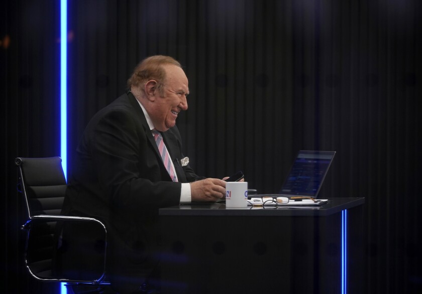 Presenter Andrew Neil prepares to broadcast from a studio during the launch event for new TV channel GB News in London, Sunday June 13, 2021. A new news channel launched on British television on Sunday evening with the aim of giving a voice “to those who feel sidelined or silenced.” GB News, which is positioning itself as a rival to the news and current affairs offerings of the likes of BBC and Sky News, denies it will be the British equivalent of Fox News. However, it clearly wants to do things differently. (Yui Mok/PA via AP)