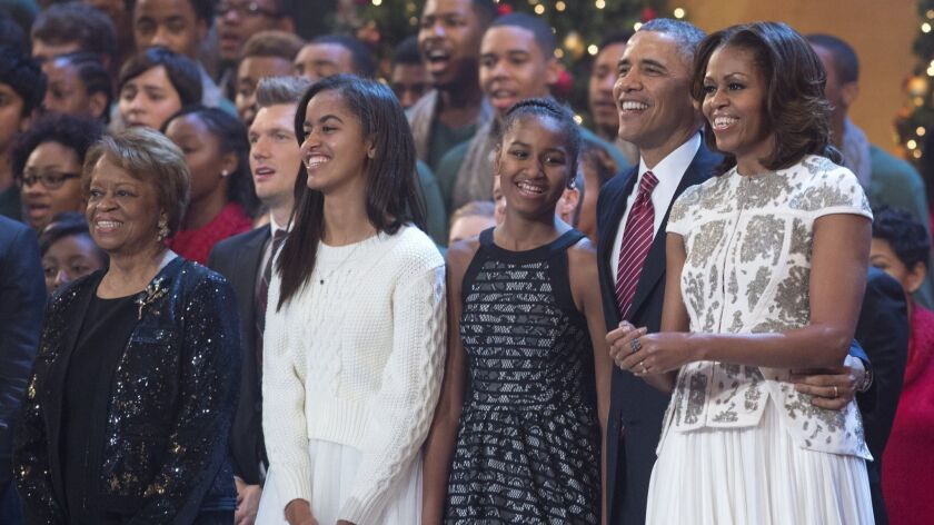 The Obama family sings during a taping of TNT's "Christmas in Washington" at the National Building Museum in December 2013.