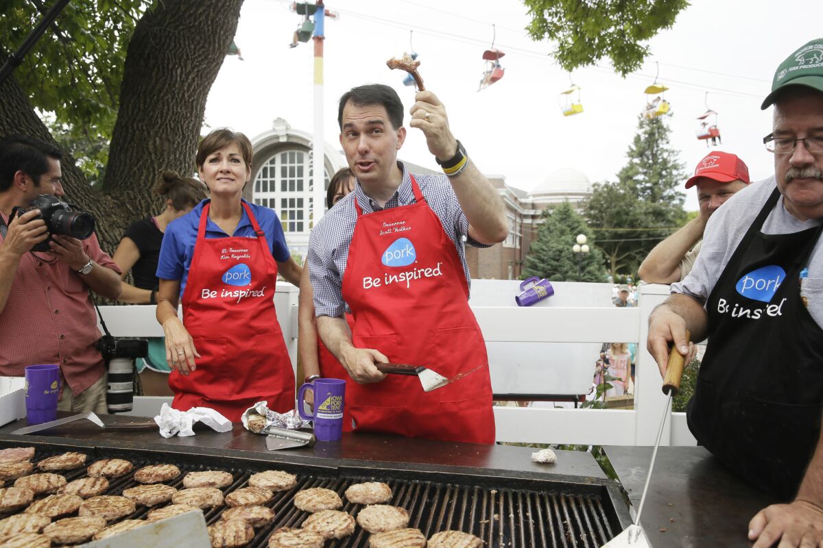 Republican presidential candidate Scott Walker, who visited the Iowa State Fair on Monday, traveled to Minnesota on Tuesday, where he gave a speech on his plan to replace Obamacare.
