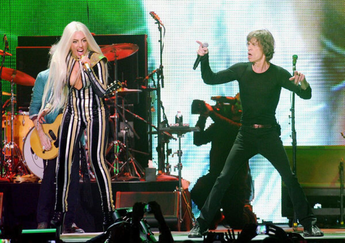 Lady Gaga joins Mick Jagger and the Rolling Stones at a Dec. 15 concert at the Prudential Center in Newark, N.J., celebrating the Stones' 50 years in the business.