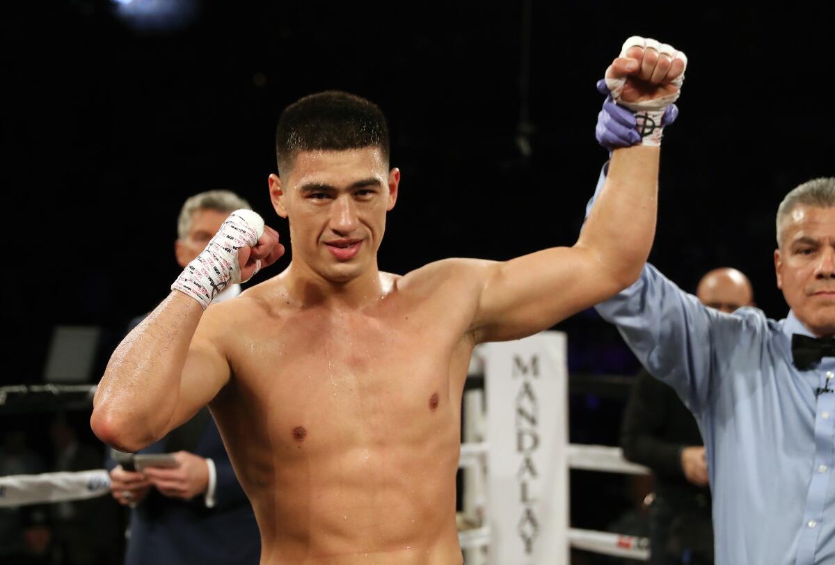 LAS VEGAS, NV - JUNE 17: Dmitry Bivol has his arm raised by referee Russell Mora after defeating Cedric Agnew with a fourth-round TKO during their light heavyweight bout at the Mandalay Bay Events Center on June 17, 2017 in Las Vegas, Nevada. (Photo by Christian Petersen/Getty Images)