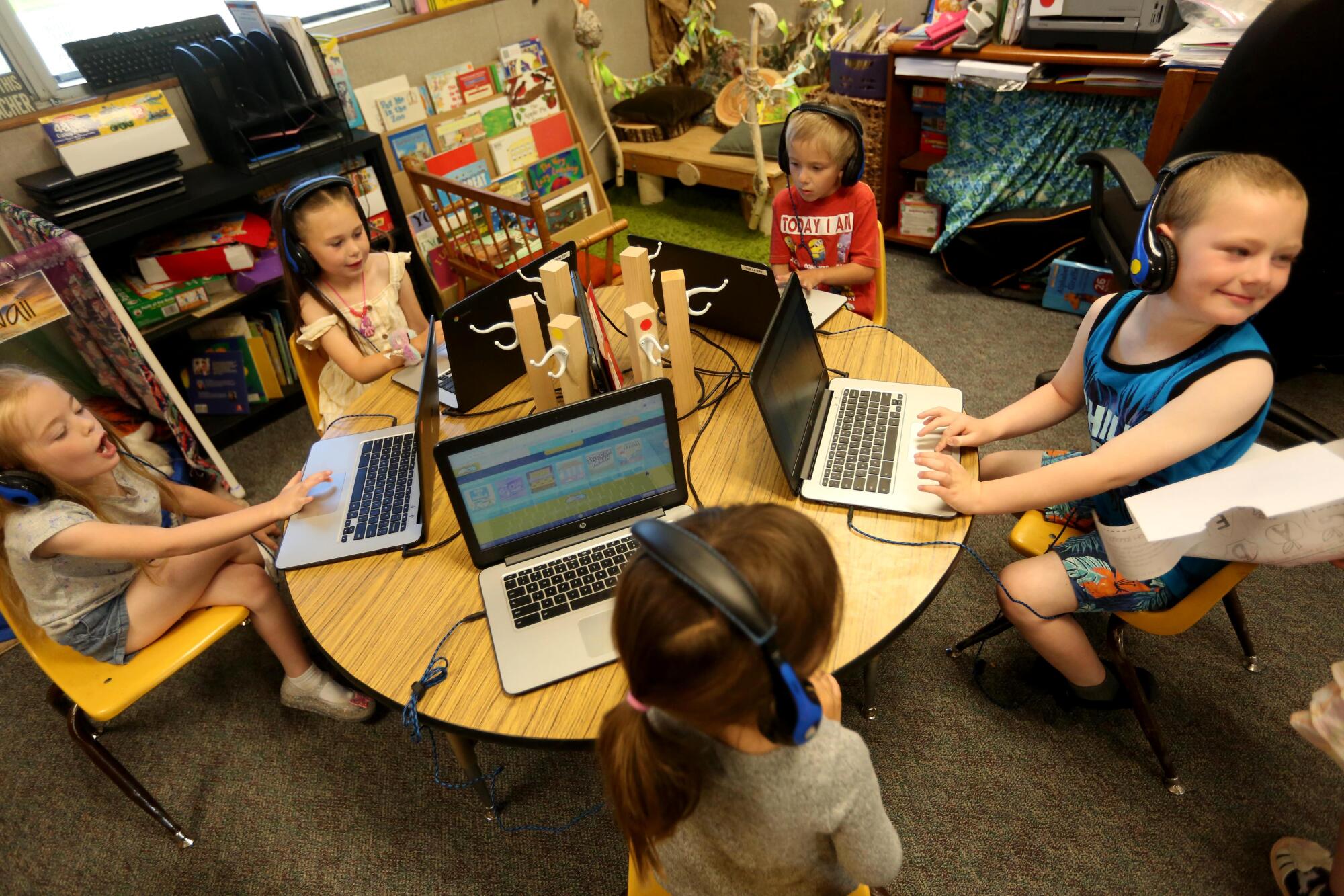 Students work on laptops in a combined TK and kindergarten class at Alturas Elementary.