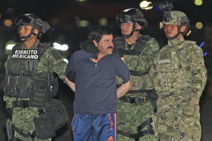 epa05320336 File picture taken on 08 January 2016 showing Mexican drug lord Joaquin "el Chapo" Guzman Loera after arriving to Mexico City to the Altiplano maximun security prision, after been captured in Los Monchis. Mexico's Foreign Relations Secretary Claudia Ruiz Massieu announced on 20 May 2016 that the Government will allow 'El Chapo' Guzman to be extradited to the US. EPA/Mario Guzmán ** Usable by LA, CT and MoD ONLY **