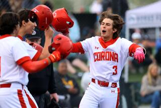 Billy Carlson of Corona celebrates after hitting a three-run home run in the first inning against La Mirada.