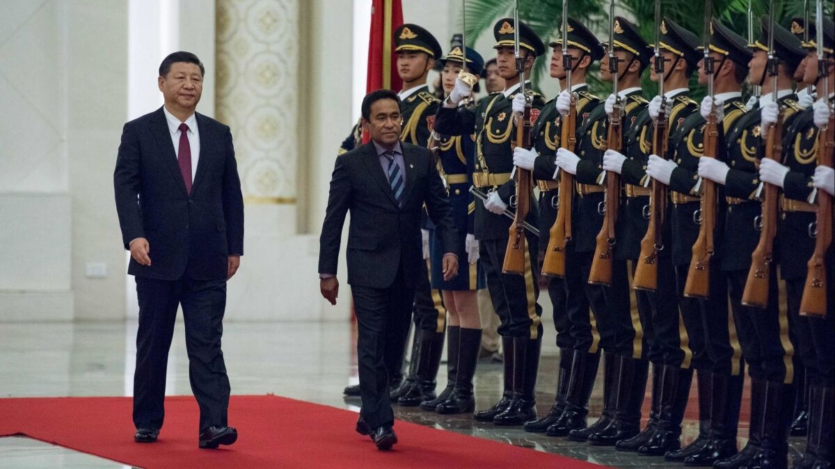 Maldivian President Abdulla Yameen, right, met with his Chinese counterpart, Xi Jinping, in Beijing in December 2017.