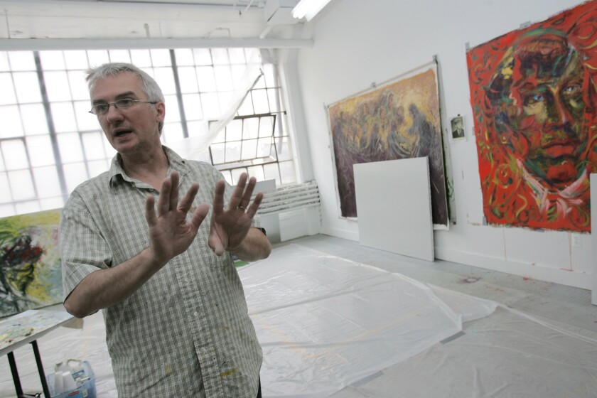 Artist Andrzej Sikora speaks of his art work in his studio at The Russell Industrial Center in Detroit, June 19, 2008. The Detroit-area artist whose studio was where the parents of the Oxford High School student charged in a deadly shooting were found by police is cooperating with police and didn’t know the couple had stayed overnight, his attorney said Sunday, Dec. 5, 2021. (Mandi Wright/Detroit Free Press via AP)