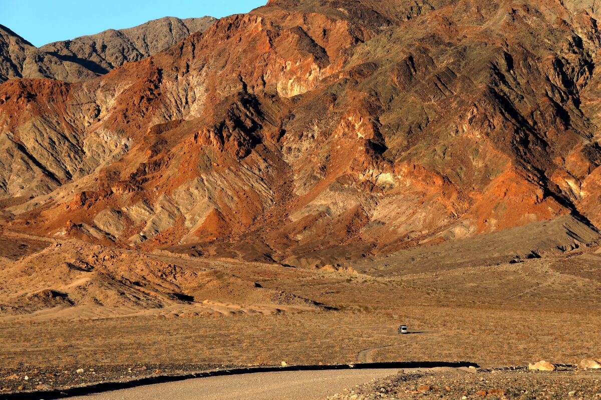 Barren hills and a desert.