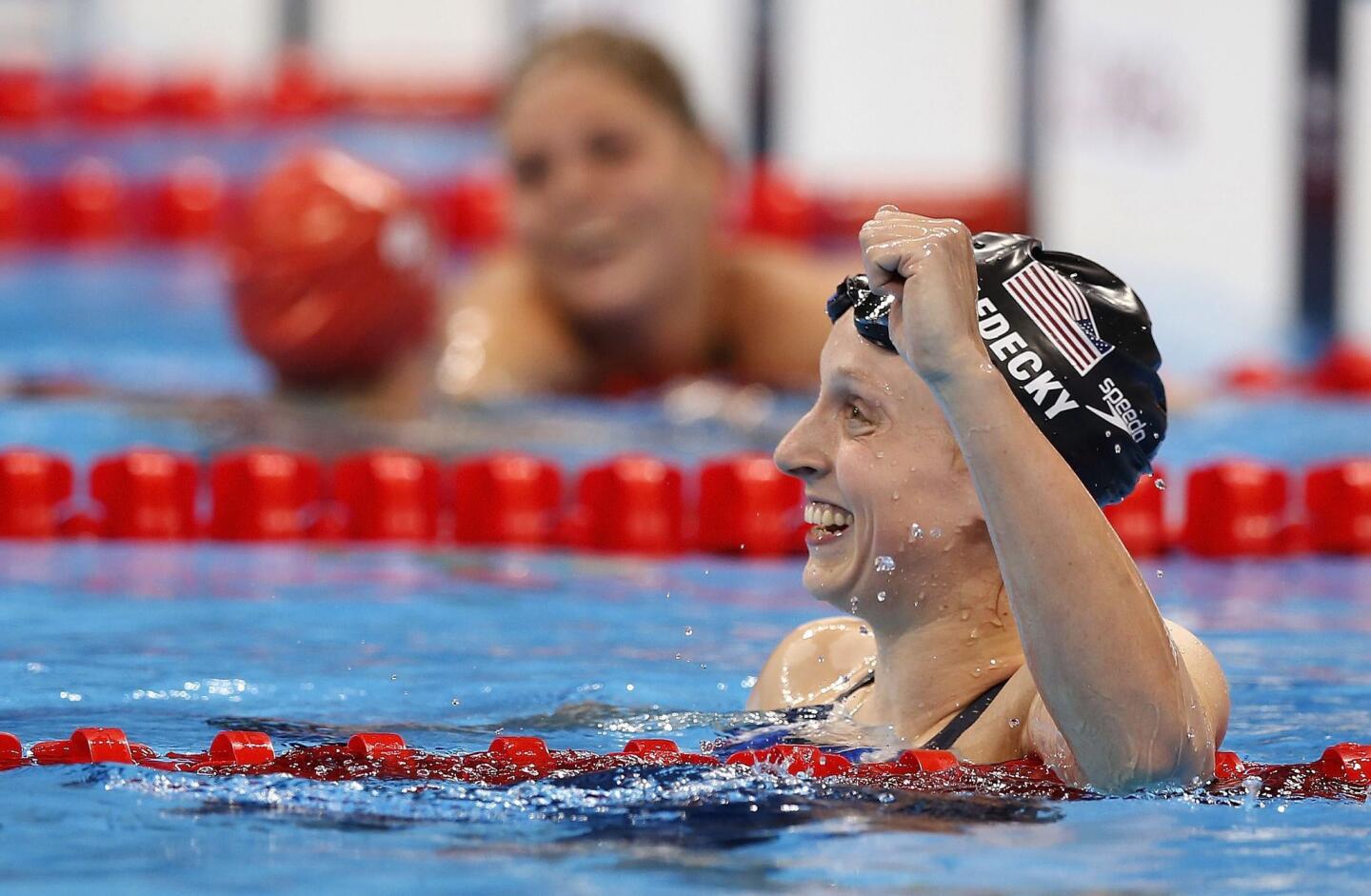Katie Ledecky of USA celebrates after winning in the women's 800m Freestyle Final race of the Rio 2016 Olympic Games Swimming events at Olympic Aquatics Stadium at the Olympic Park in Rio de Janeiro, Brazil.