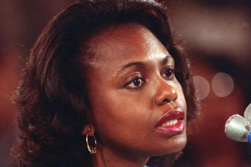 University of Oklahoma law professor Anita Hill testifies before the Senate Judiciary Committee on the nomination of Clarence Thomas to the Supreme Court on Capitol Hill in Washington, D.C., Friday, Oct. 11, 1991. Hill testified that she was "embarrassed and humiliated" by unwanted, sexually explicit comments made by Thomas when she worked for him a decade ago. (AP Photo/John Duricka)