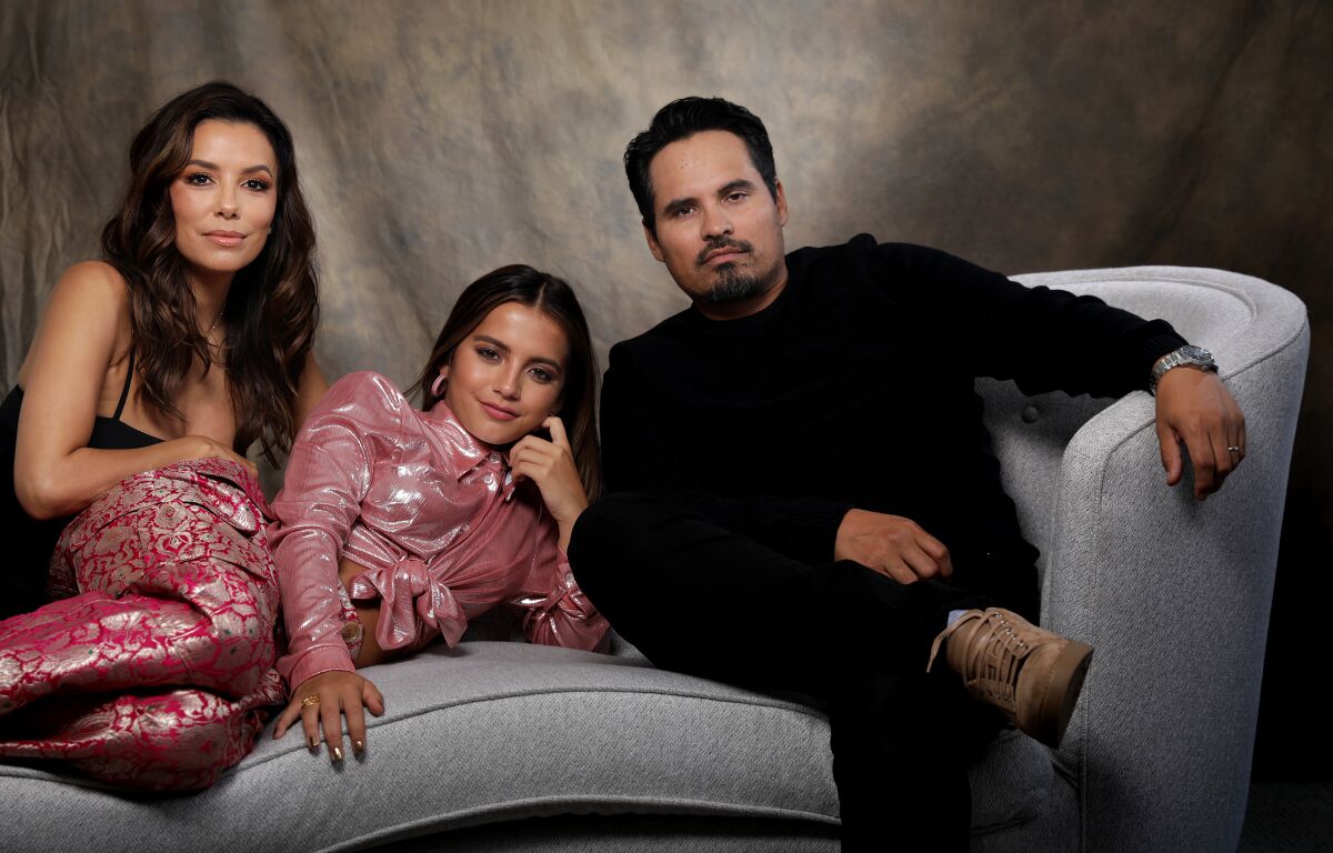 From left, Eva Longoria, Isabela Moner and Michael Peña star in “Dora and the Lost City of Gold," a live-action adaptation of Nickelodeon's beloved "Dora the Explorer" cartoon.