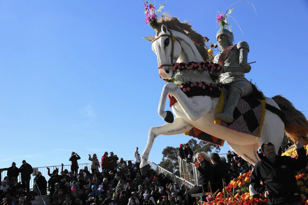 Farmers Insurance's float "Dream Big: World of Possibility" appears to tower over the crowd during the 2015 Rose Parade.