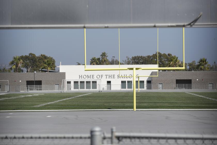 Newport-Mesa Unified School District was set to begin summer sports on Monday, July 6, until some clarification from officials at the county and state levels came in cancelling those plans until the state can develop guidelines. An empty Newport Harbor High field is shown above on Tuesday.