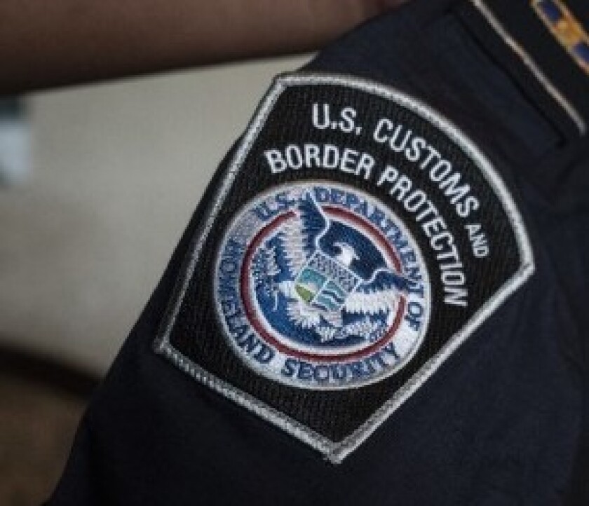 A U.S. Customs and Border Protection patch on an agent's uniform