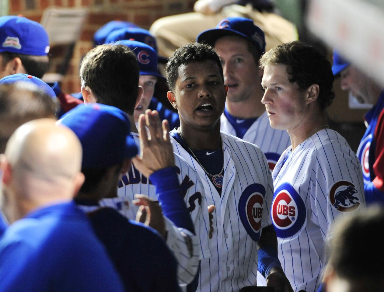 Starlin Castro is greeted after scoring during the fourth inning.