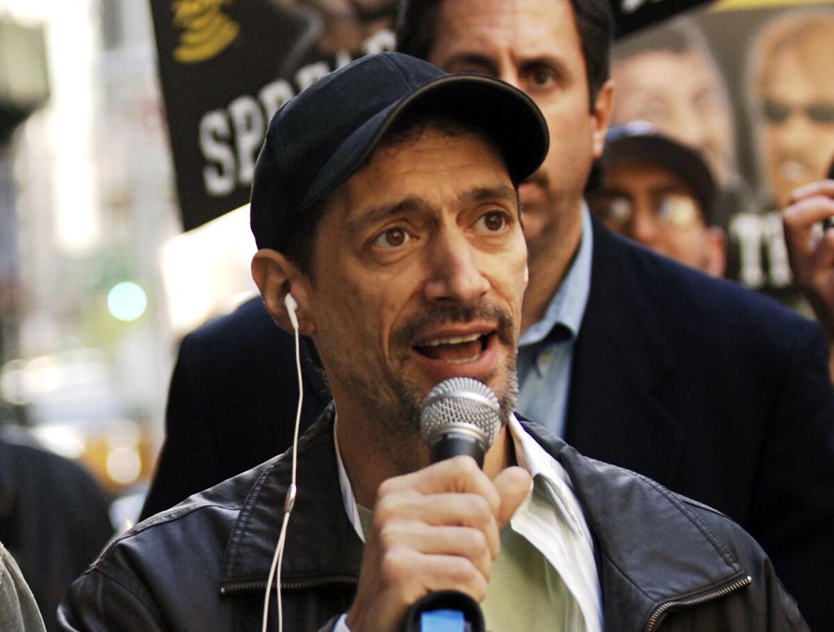 Radio shock jock Anthony Cumia is facing charges over an altercation with a woman at his New York home.