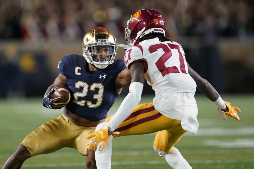 USC takeaways: Jaxson Dart wouldn’t have saved the Trojans against Notre Dame 14 Notre Dame running back Kyren Williams (23) runs in front of USC safety Calen Bullock