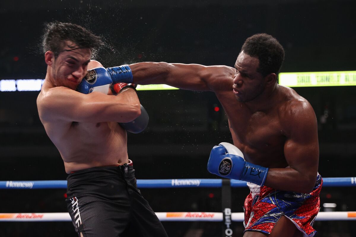 Frank Sanchez punches Julian Fernandez during their fight at the Alamodome on Saturday.