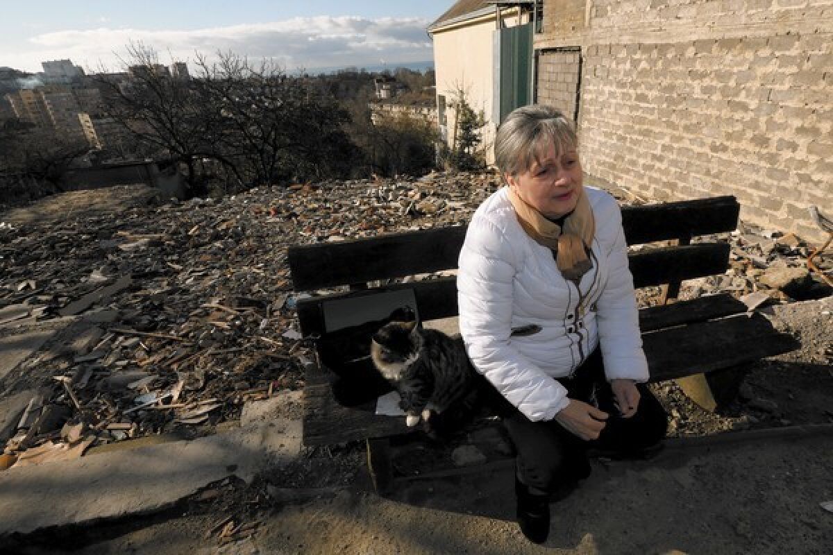 "There is nothing I hate so much as these Olympic Games, which made me and my family a miserable bunch of bums," said Sochi resident Nina Toromonyan, 63, whose family lost its home and land.