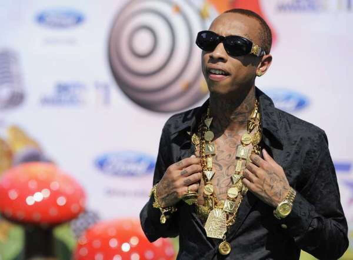In this June 26, 2011, file photo Tyga arrives at the BET Awards in Los Angeles.