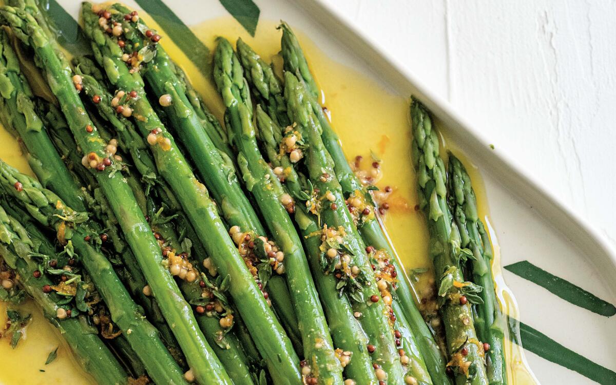 Maple, mustard and orange combine for a sweet, pungent dressing for freshly-blanched asparagus.