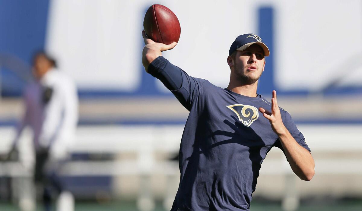 Rams quarterback Case Keenum passes the ball as he warms up before a game in London against the New York Giants.