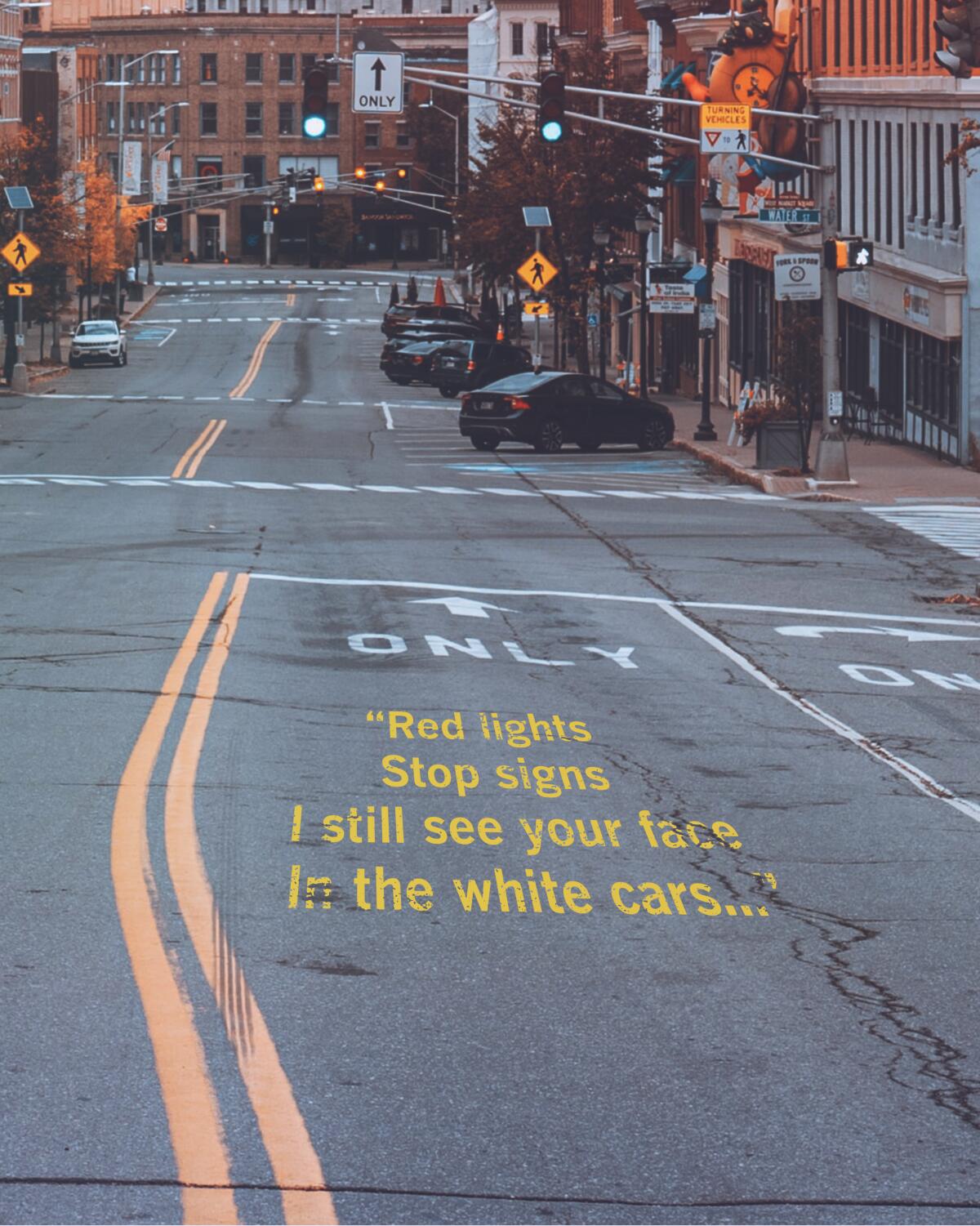 Photo of a town's street with lyrics from Olivia Rodrigo's "Drivers License" displayed on the road. 
