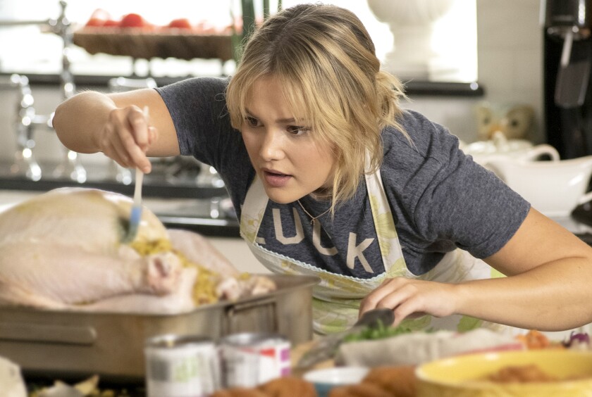 Olivia Holt in the new holiday comedy "Turkey Drop" on Freeform.