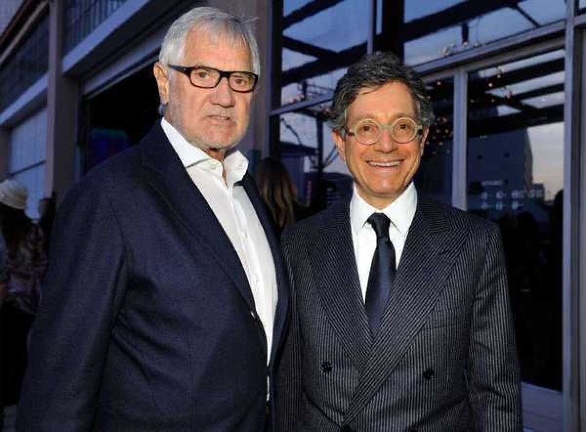 Producer Gil Friesen, right, and director of MOCA Jeffrey Deitch in April in Los Angeles. Friesen, best known for his tenure as president of A&M; Records and A&M; Films, died at his Brentwood home on Thursday.