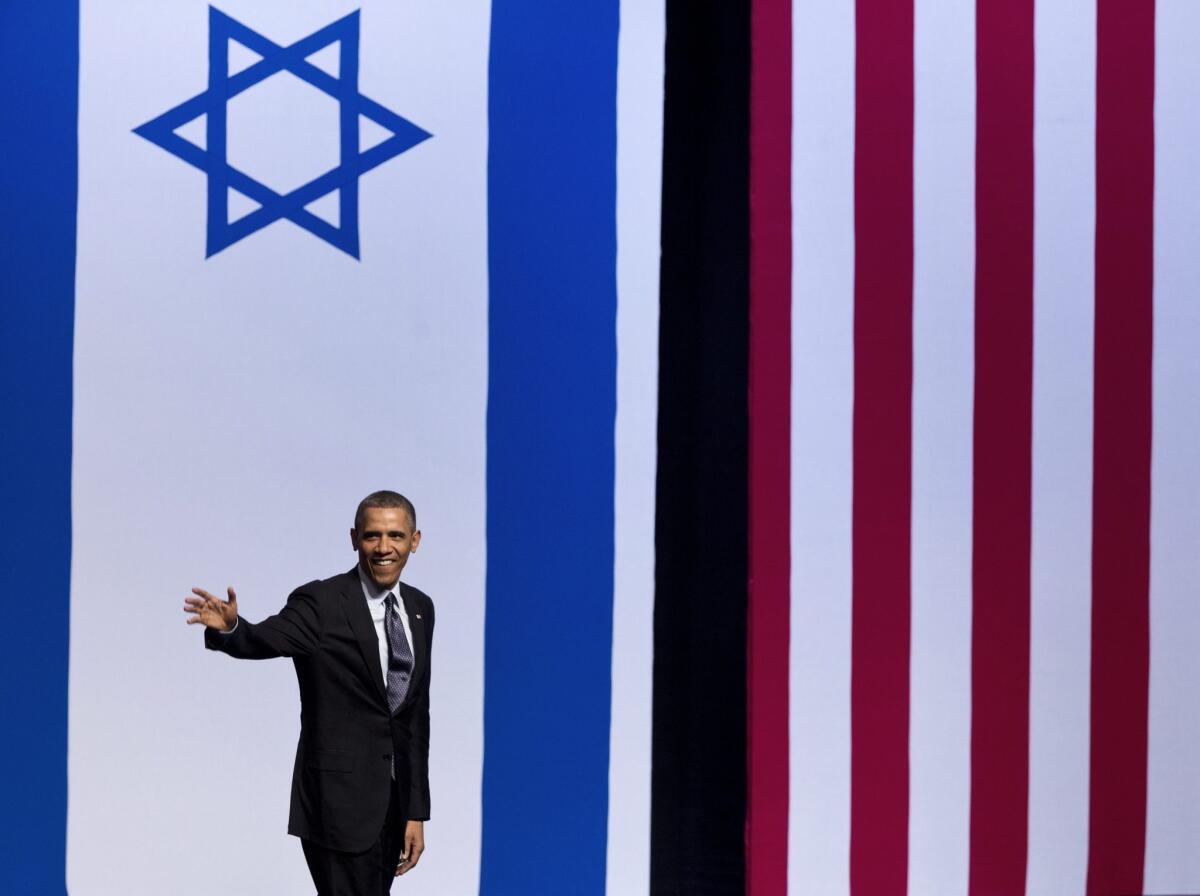 President Obama waves after his speech at the Jerusalem International Convention Center.