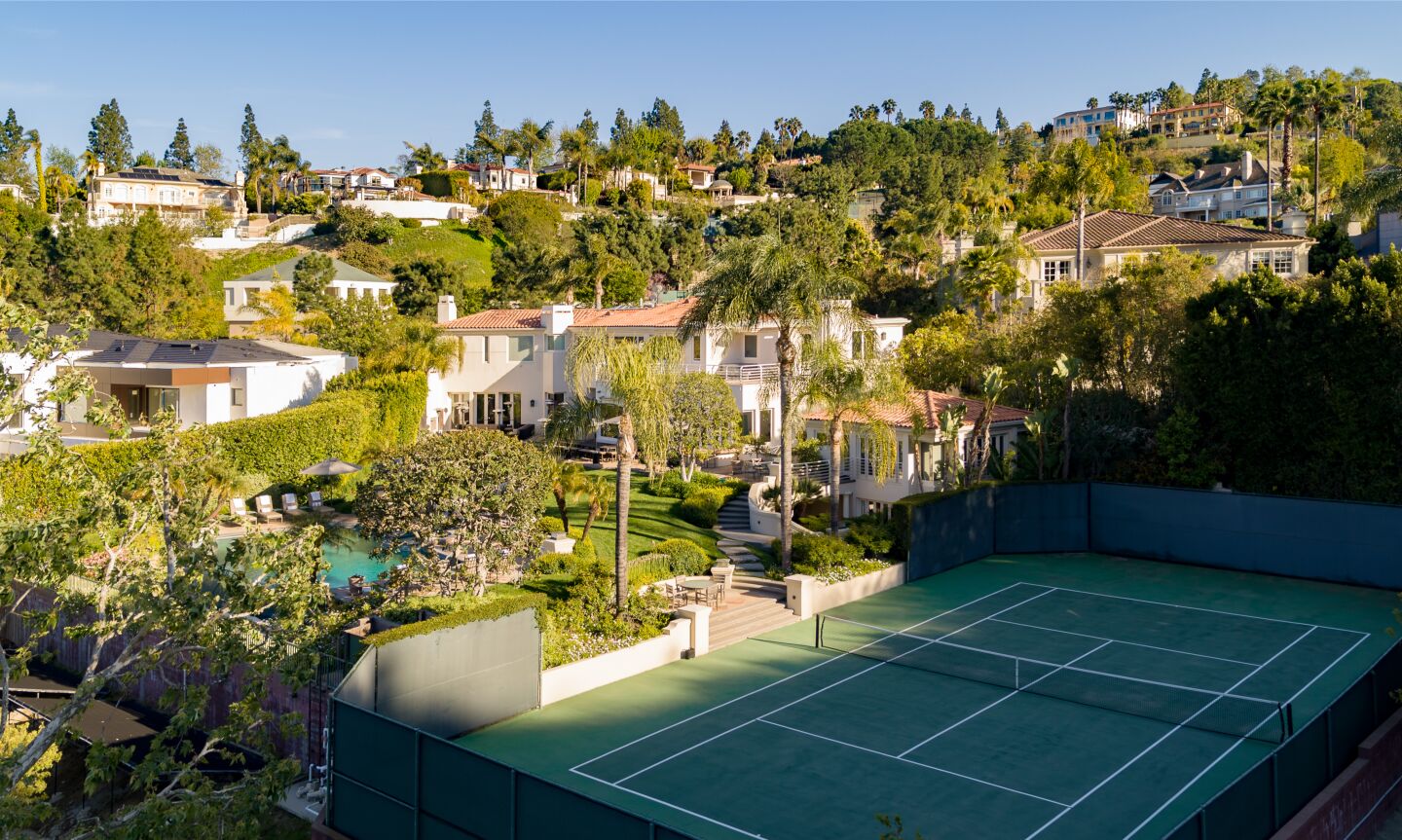 The tennis court.