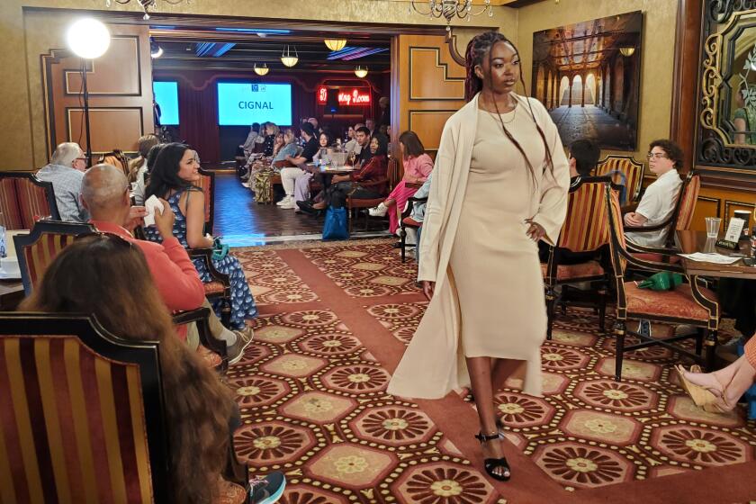 Fashions from La Jolla boutiques took to the runway at The Living Room restaurant during "Posh on Prospect" on May 11.