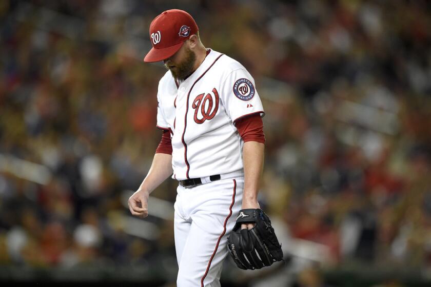 Washington Nationals relief pitcher Drew Storen walks off the field to the dugout during a game against the Colorado Rockies on Aug. 7.