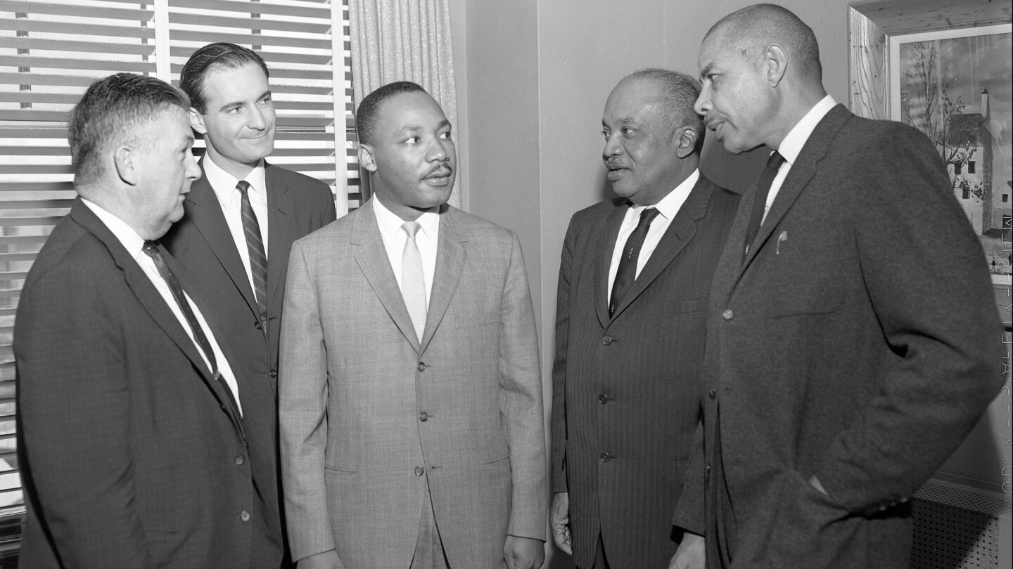 June 15, 1962 -- Rev. Martin Luther King (middle) holds a press conference with (from left) City Councilmember Frank Curren, Rabbi Joel Goor, Rev. C.H. Hampton and Rev. E. Major Shavers in his room at the El Cortez Hotel. Photo: John Greensmith/U-T San Diego file photo