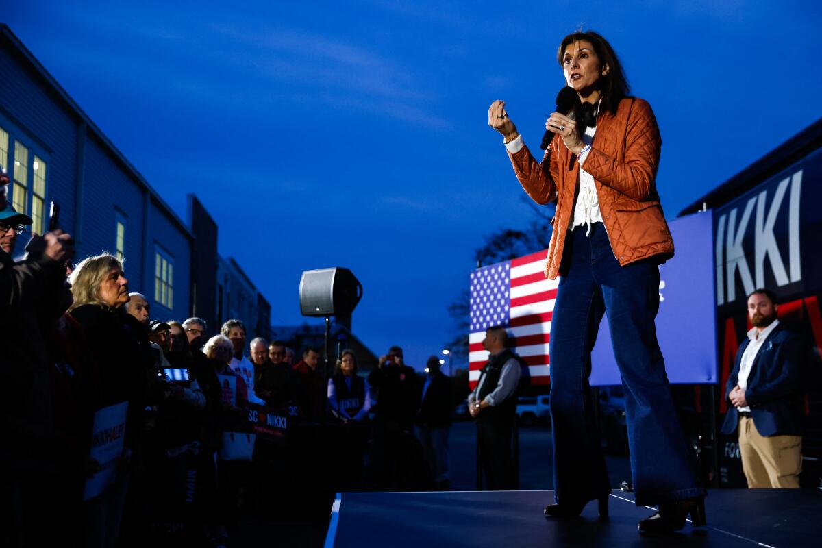 Nikki Haley on stage in casual attire 