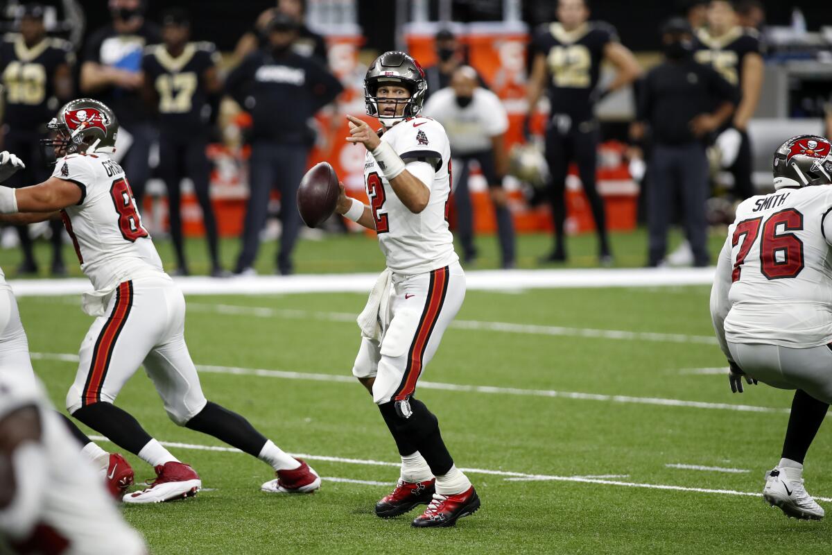 Tampa Bay Buccaneers quarterback Tom Brady looks to pass against the New Orleans Saints on Sept. 13.