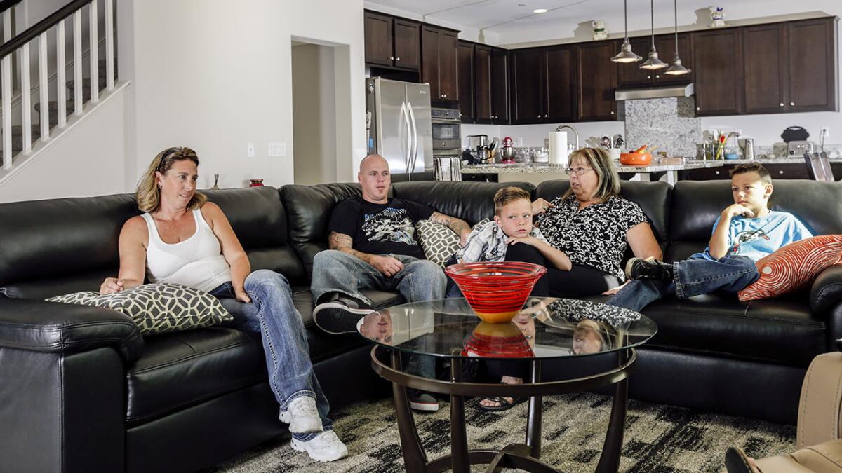 Marie Clausman spends quality time with daughter Cassandra, left; Cassandra’s partner, Tim Essary; and the Essary boys: Austin, 7, and Aiden, 10.