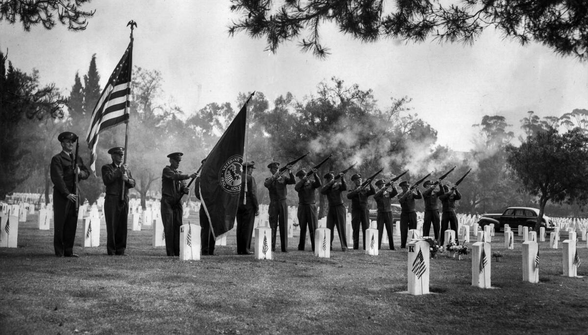 May 30, 1951: A Veterans Administration Center firing squad unleashes a volley over the graves at Sawtelle Veterans Cemetery. More than 3,000 people attended the Memorial Day services besides the graves of 31,000 veterans.