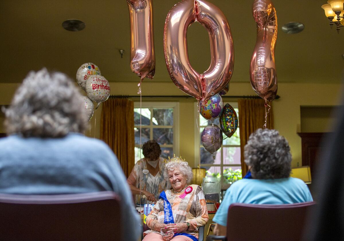 Dorothy Powell celebrates her 102nd birthday at Carmel Village in Fountain Valley on Thursday.